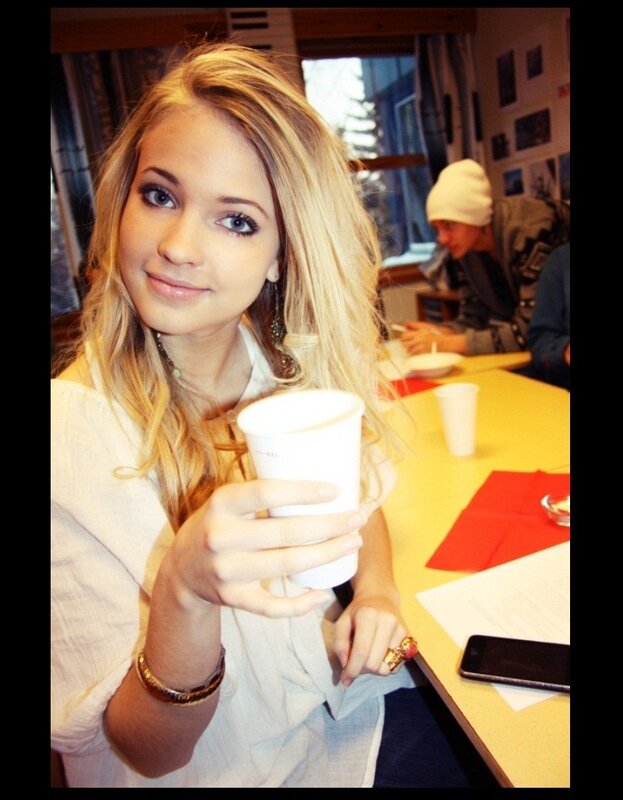 woman holding a cup
