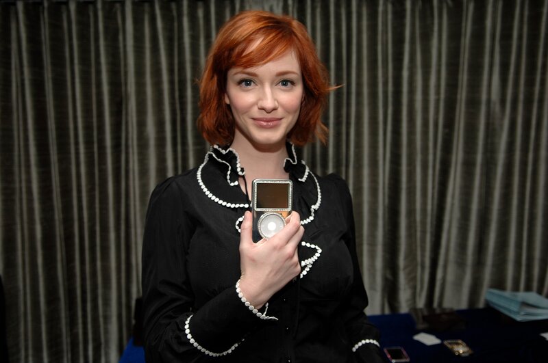 Woman holding a decorated iPod