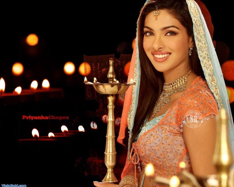 Woman holding a diya