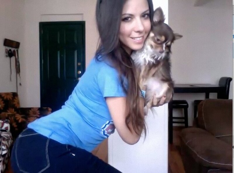 woman holding a dog