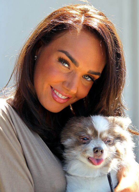 woman holding a dog