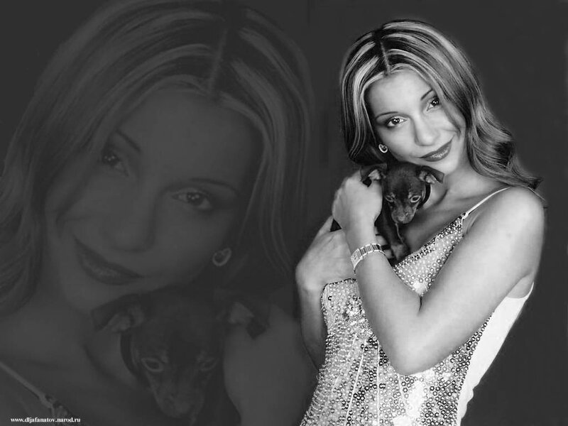 woman holding a dog