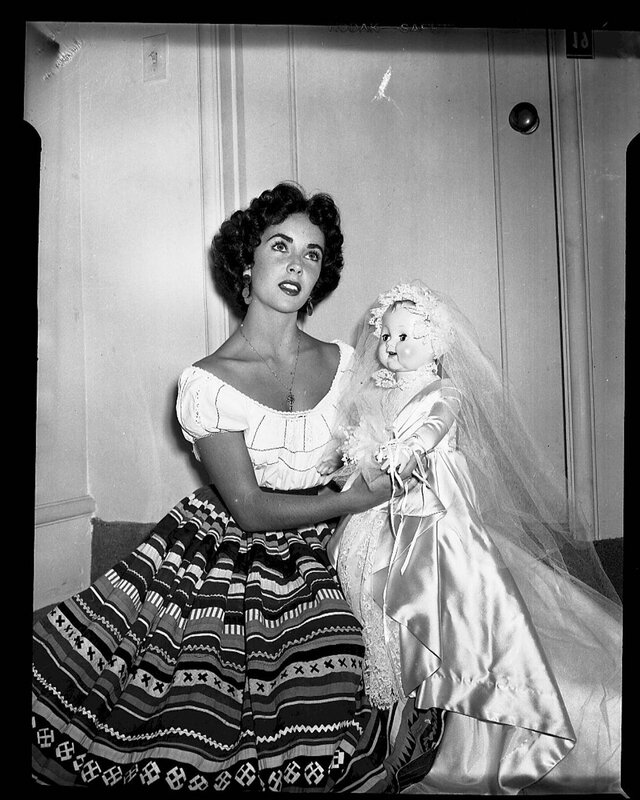 Woman holding a doll