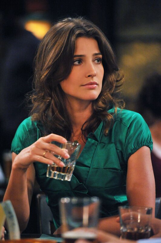 woman holding a drink