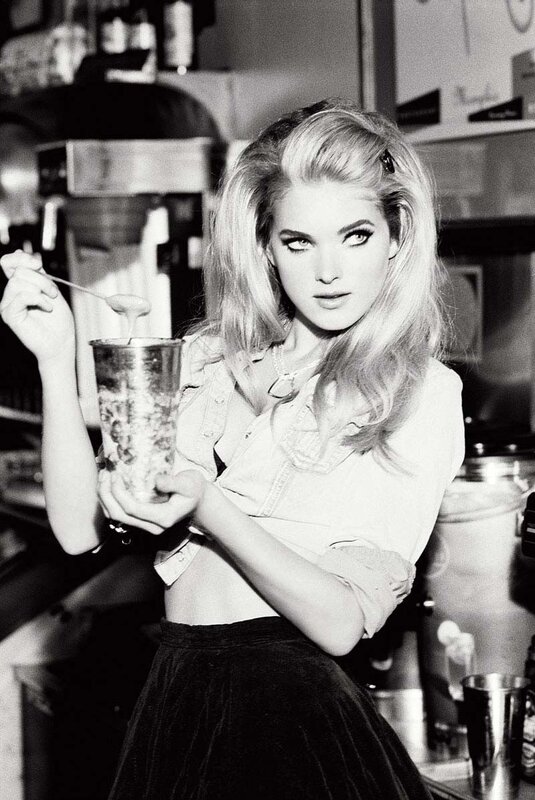 woman holding a drink