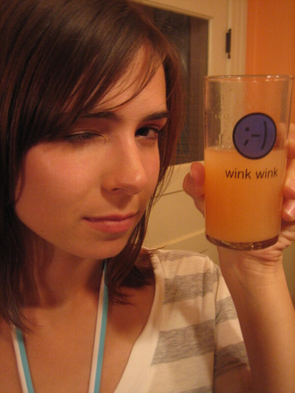 woman holding a drink