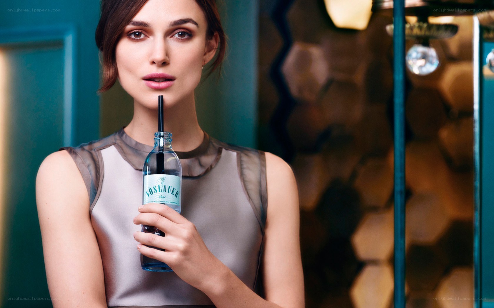 Woman holding a drink bottle