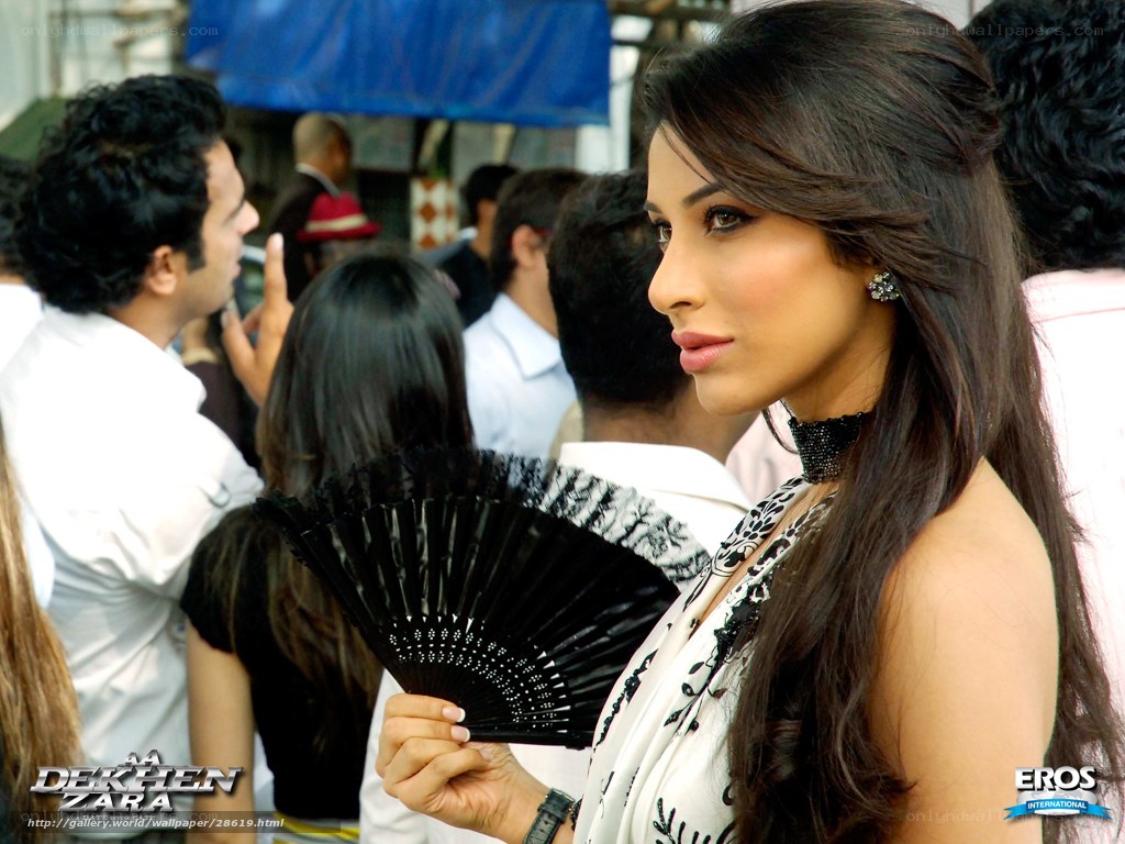 woman holding a fan