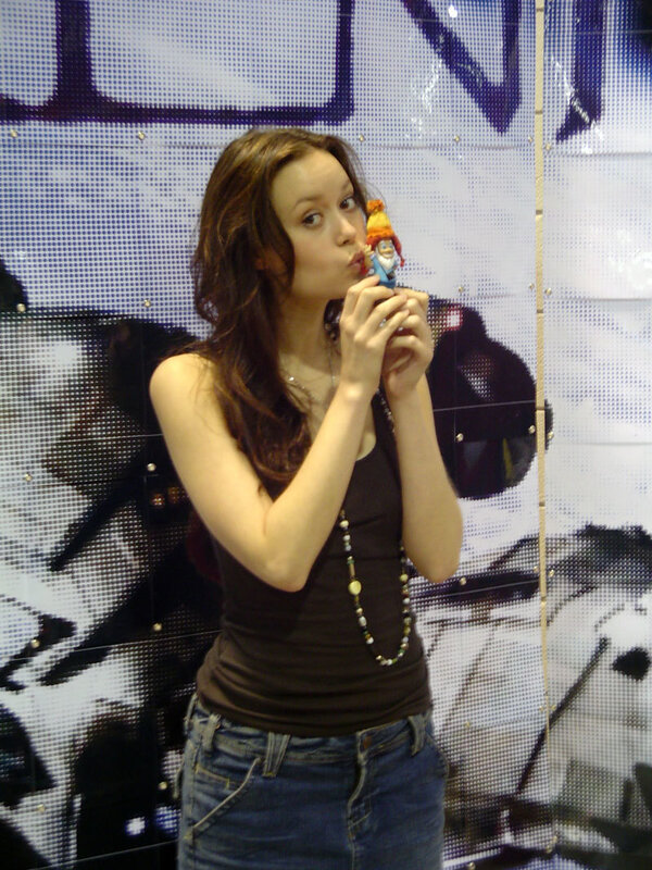 woman holding a figurine