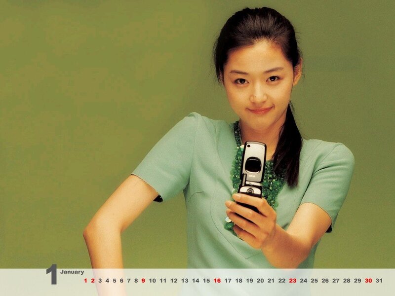 Woman holding a flip phone