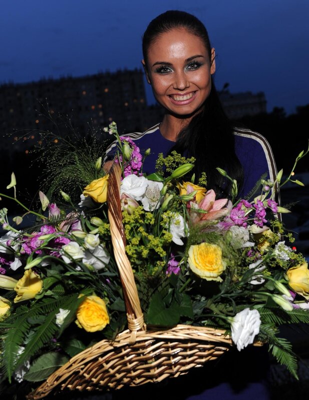 Woman holding a flower basket