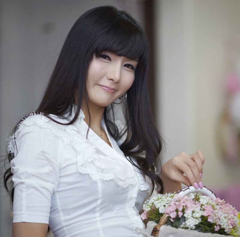 woman holding a flower basket