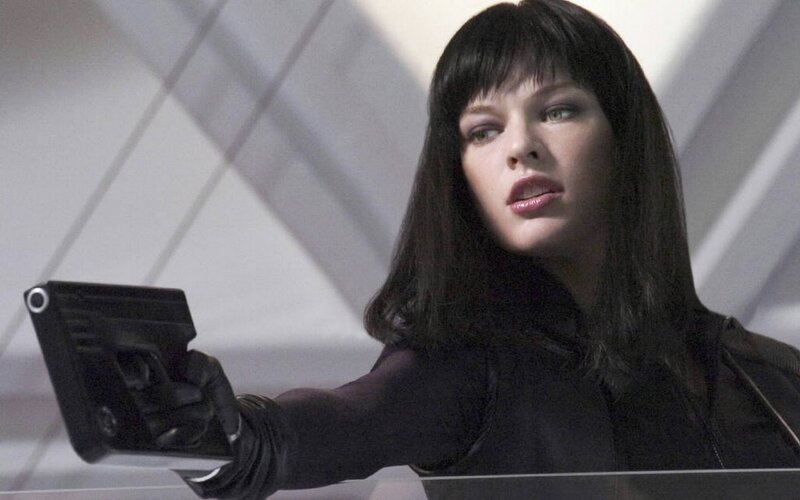 Woman holding a futuristic gun