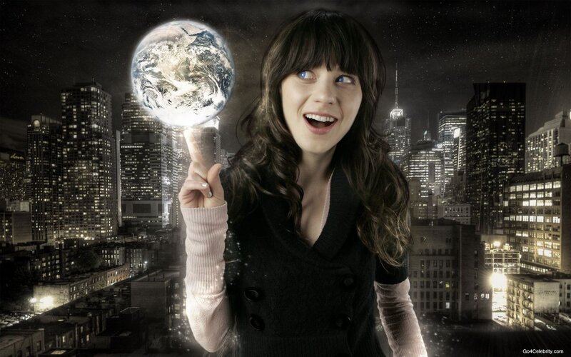 woman holding a glowing earth
