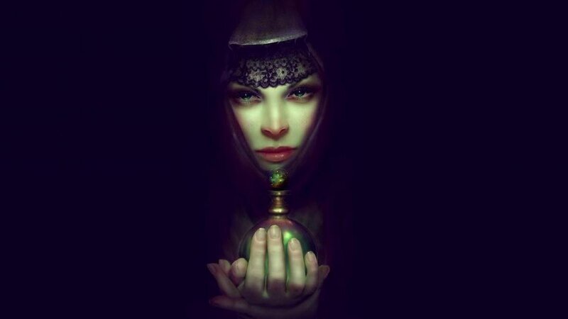 woman holding a glowing orb