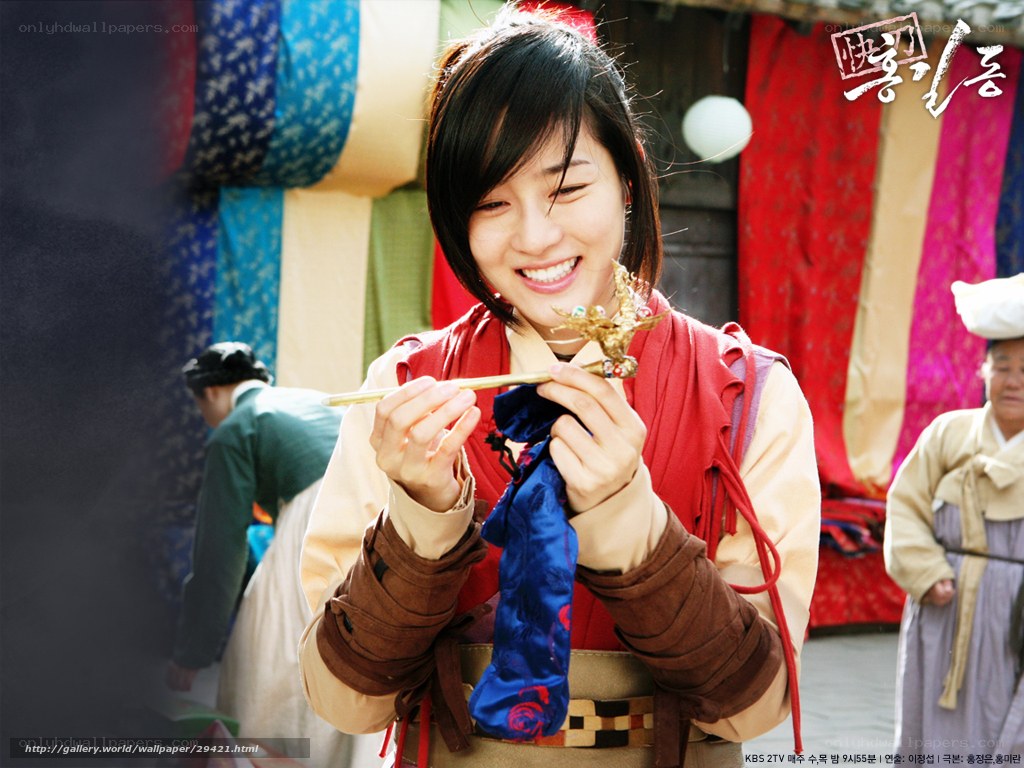 woman holding a golden ornament