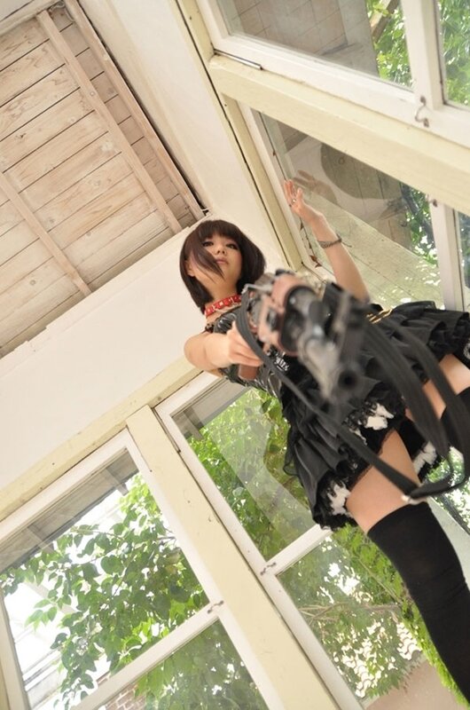 woman holding a gun