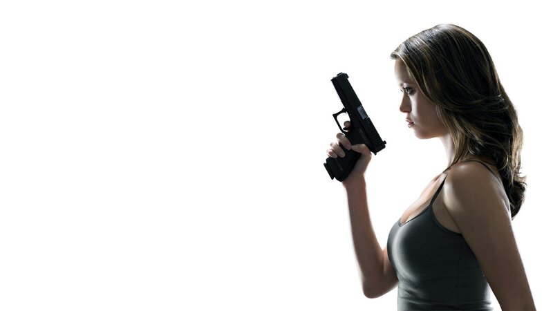 woman holding a gun