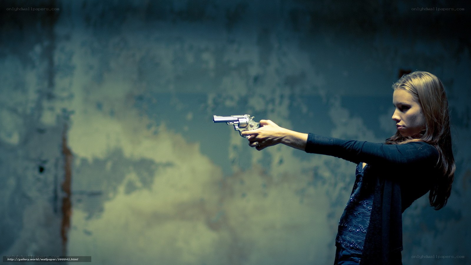 woman holding a gun
