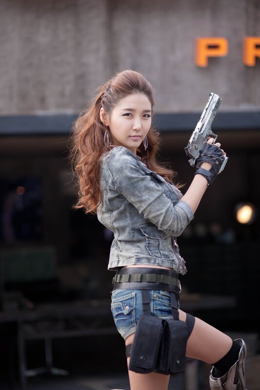 woman holding a gun