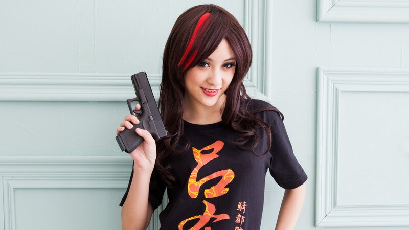 woman holding a gun