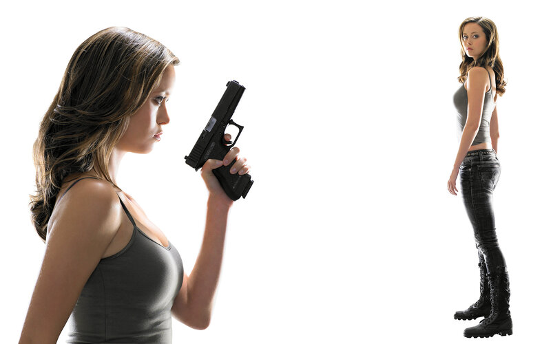 woman holding a gun