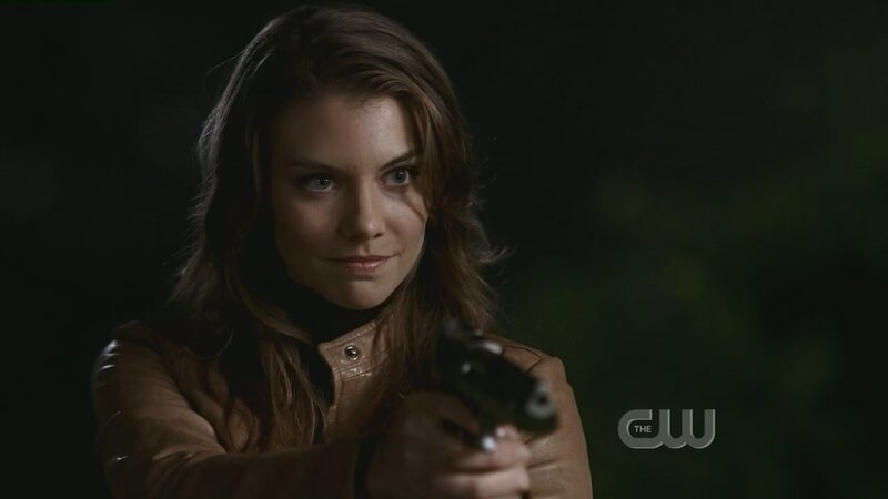woman holding a gun