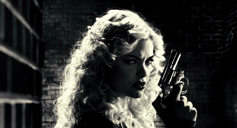 woman holding a gun