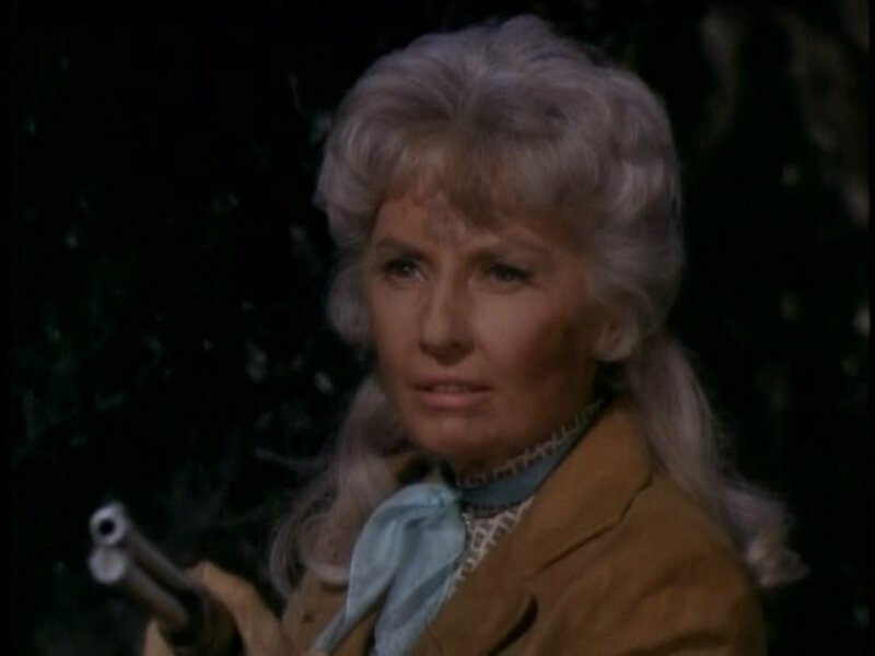 Woman Holding a Gun — Brown, Dramatic, Night