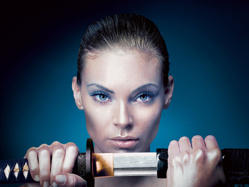 Woman holding a katana