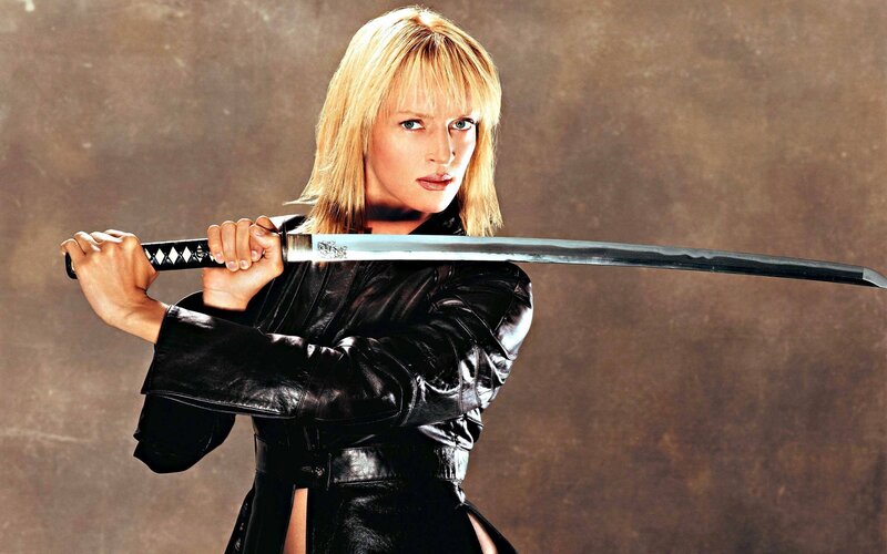 Woman holding a katana sword