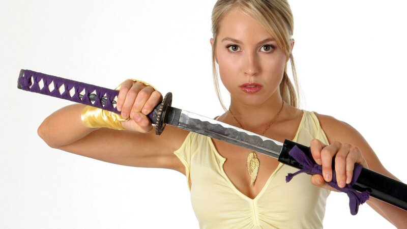 woman holding a katana