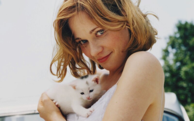 woman holding a kitten