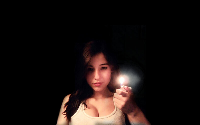 woman holding a lighter