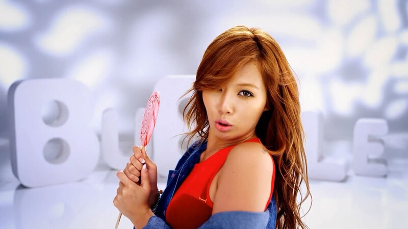 woman holding a lollipop