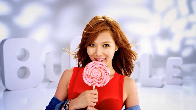 woman holding a lollipop