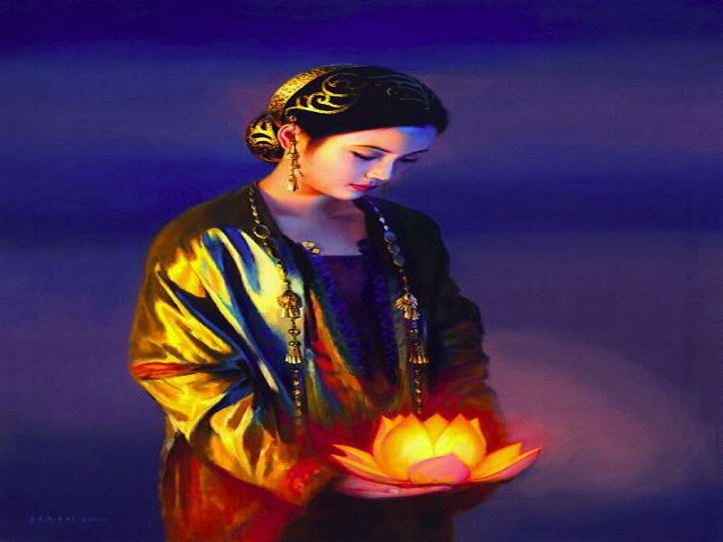 woman holding a lotus flower
