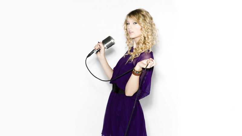 woman holding a microphone