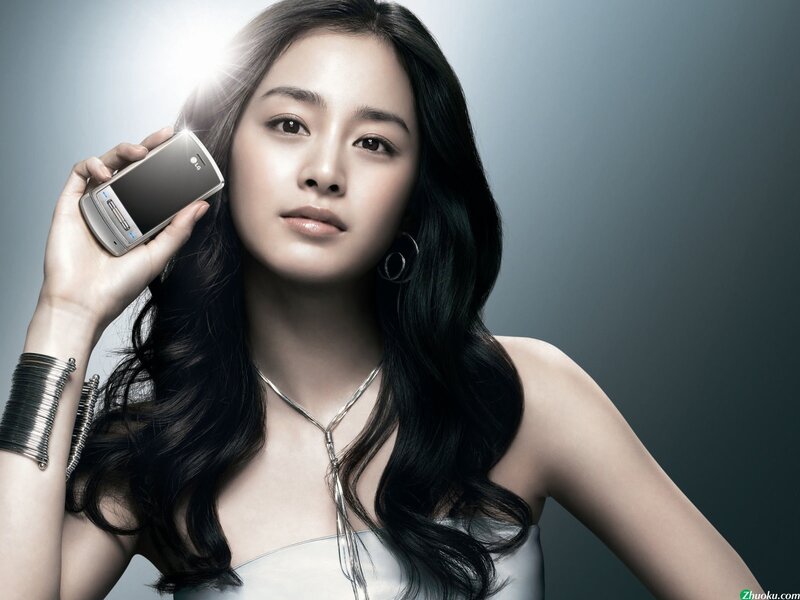 woman holding a mobile phone