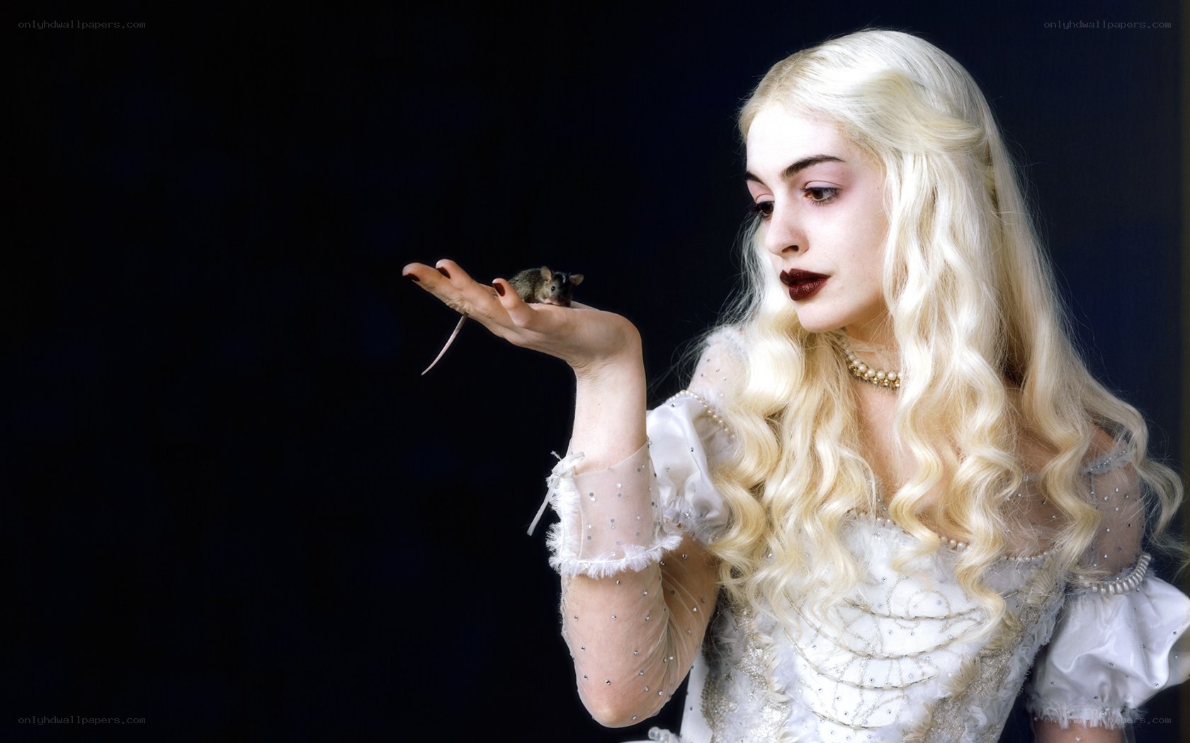 Woman holding a mouse