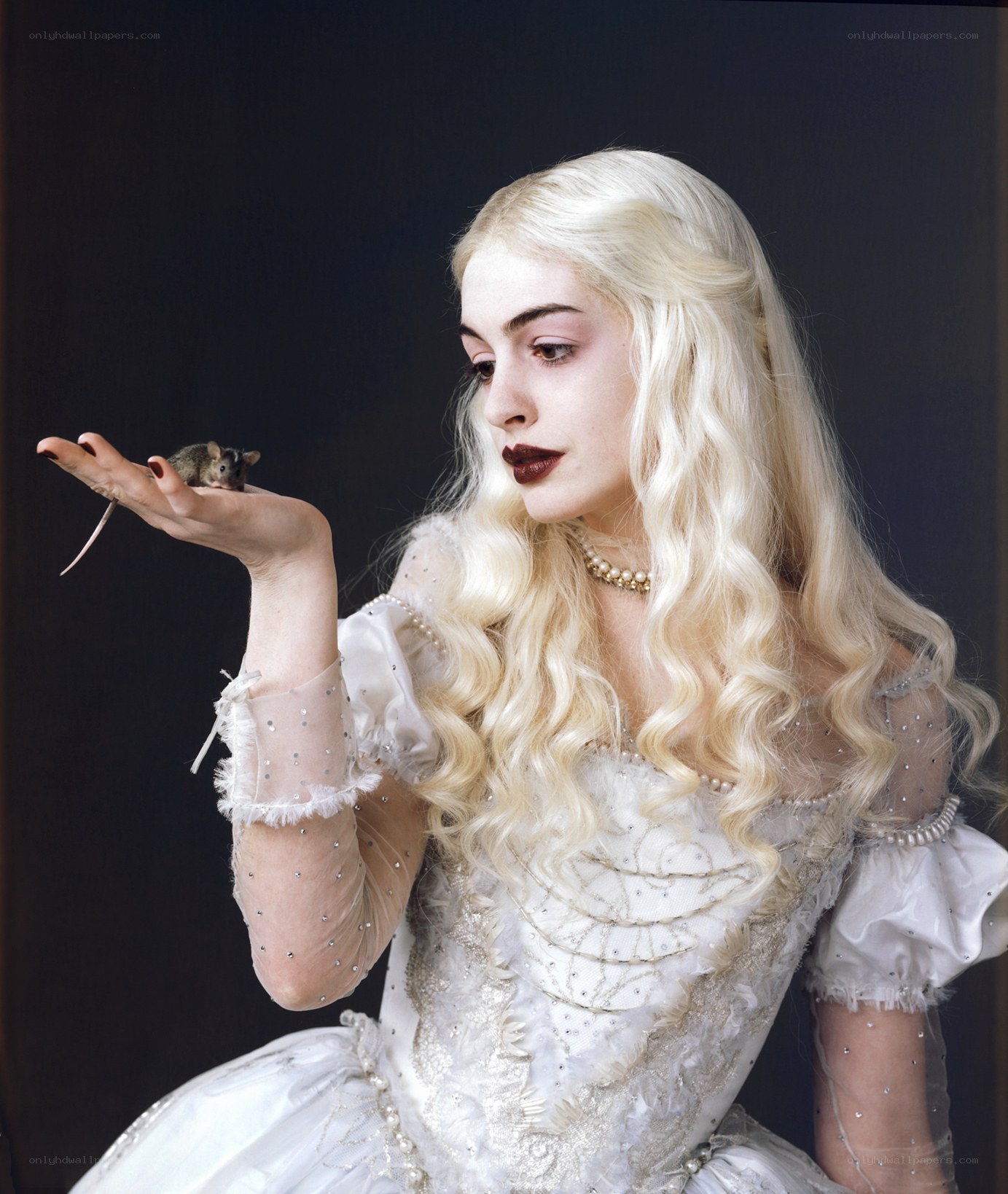 woman holding a mouse