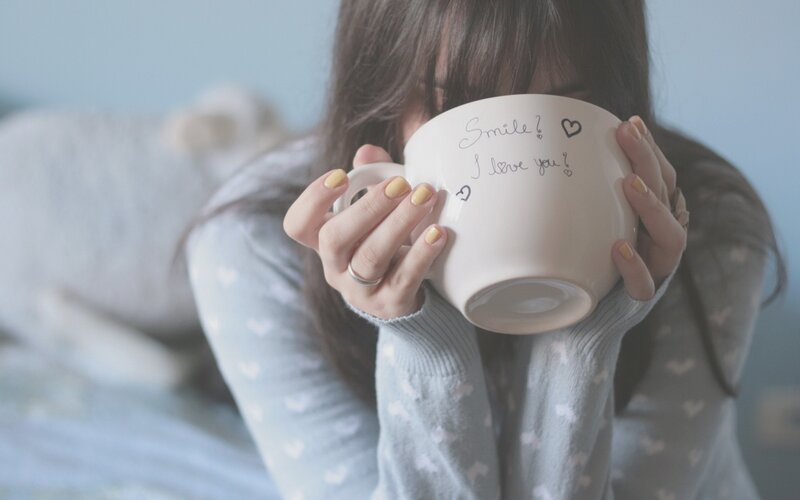 woman holding a mug