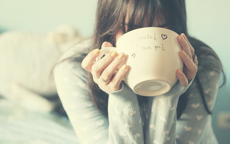 woman holding a mug