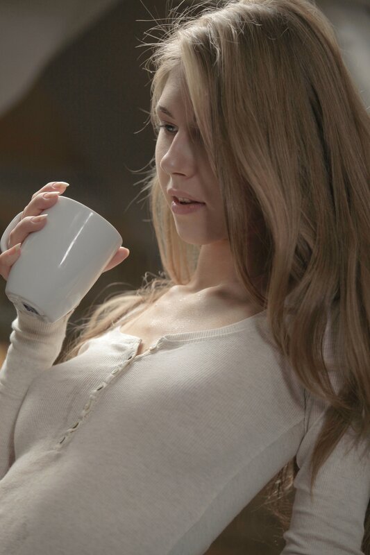 woman holding a mug