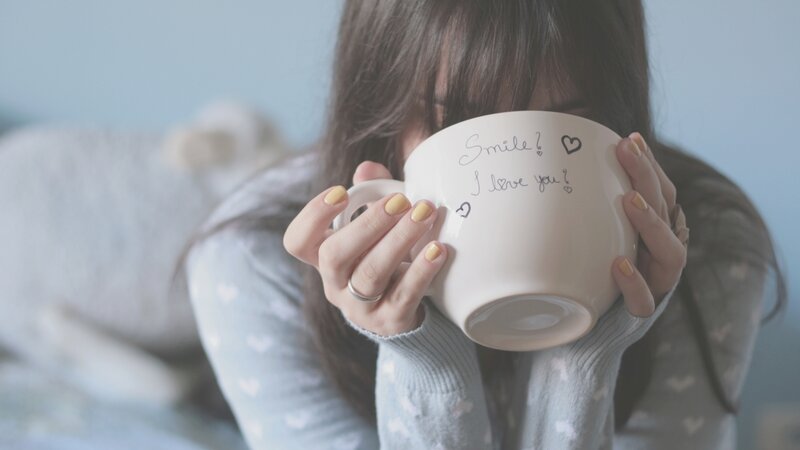 woman holding a mug