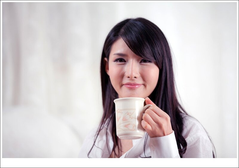 woman holding a mug