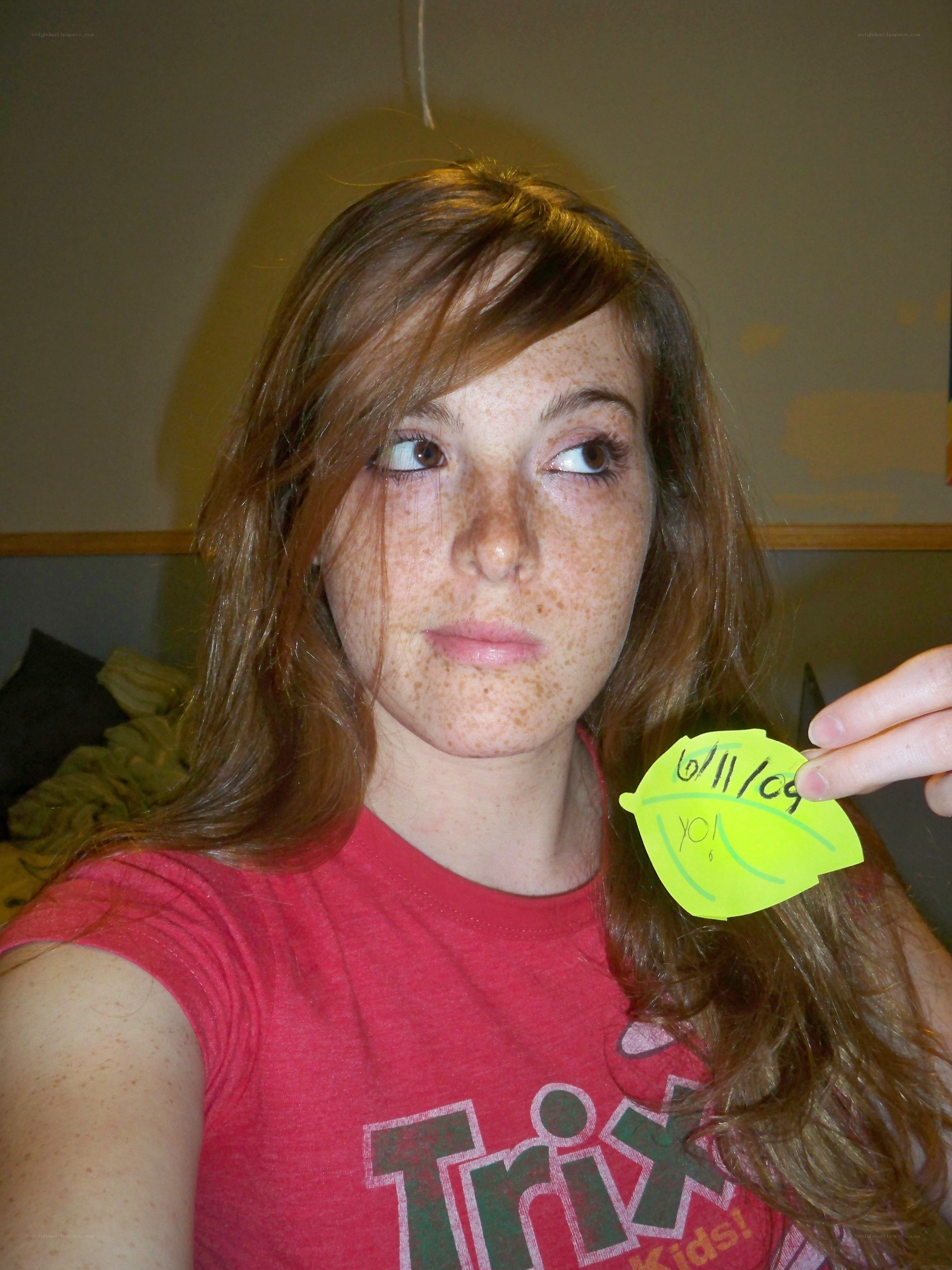 woman holding a note