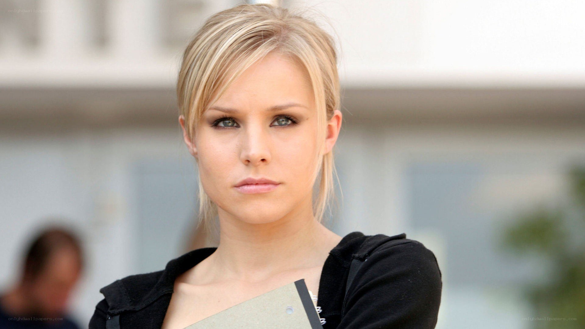 woman holding a notebook
