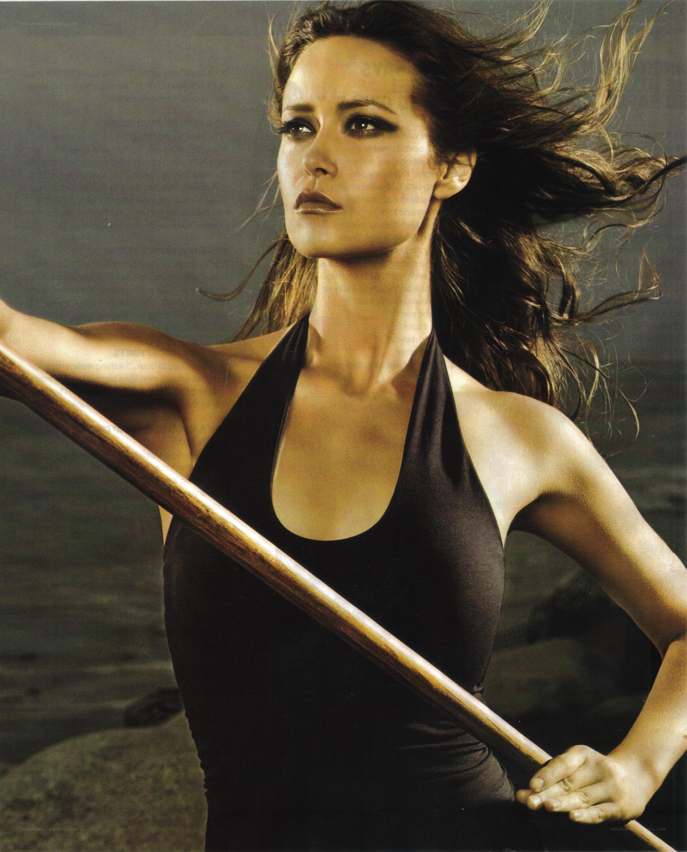 woman holding a paddle