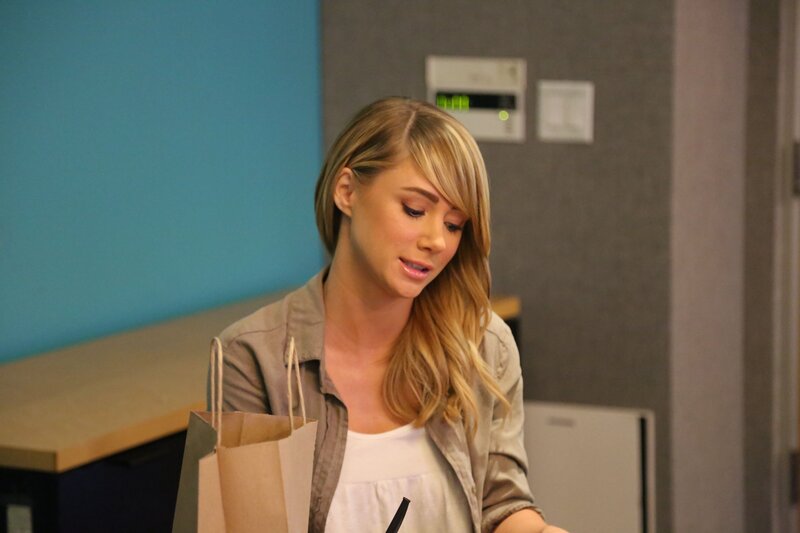 woman holding a paper bag